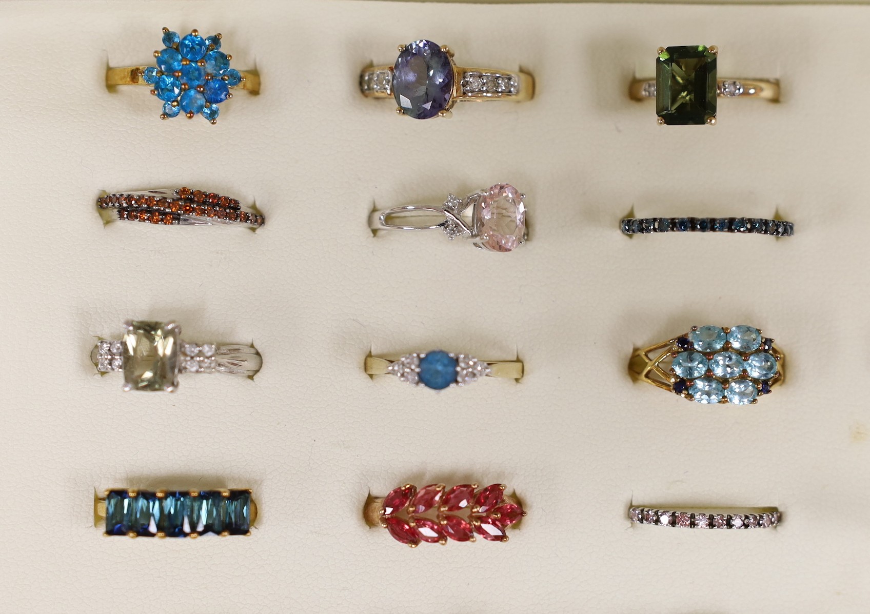 Thirty nine assorted modern 9ct gold and gem set dress rings, including amethyst and garnet and two 18ct gold and gem set rings, in ring box.